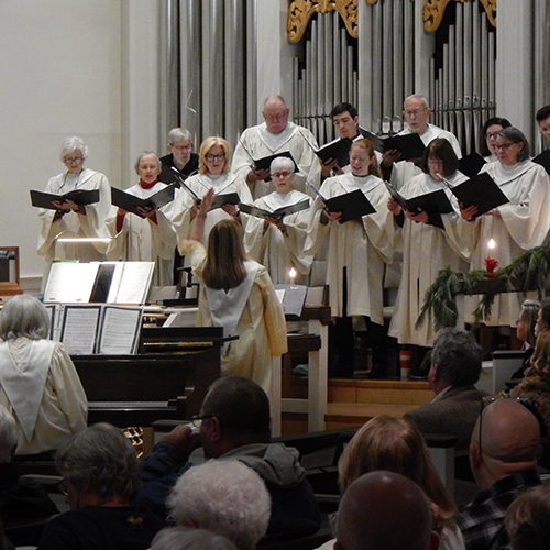 Kernersville Moravian Choir stands in front of historical pipe organ