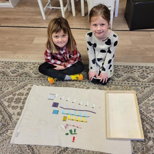 children learn in a Montessori style environment at the Kernersville Moravian Preschool in Kernersville, NC