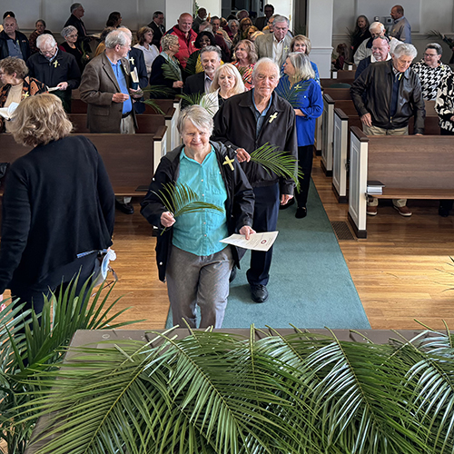 Parishioners participate in a Palm Sunday service at Kernersville Moravian Church